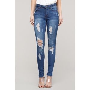 Distressed Denim Skinny Jeans